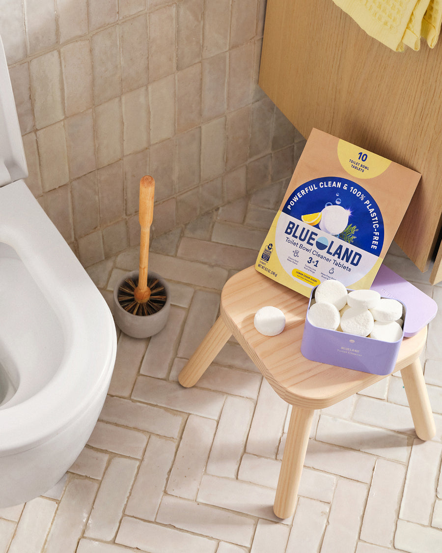 Blueland toilet bowl cleaner set in a bright bathroom